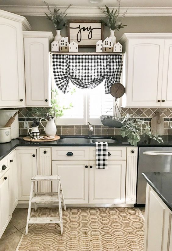 https://www.spiffyspools.com/wp-content/uploads/2022/06/a-chic-farmhouse-kitchen-done-in-black-grey-and-white-plaid-textiles-black-handles-and-a-jute-rug.jpg