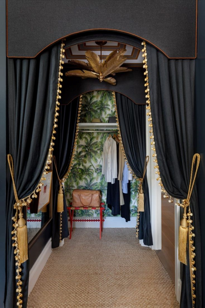 Theatrical style open doorway black curtains